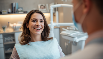 Happy patient after dental treatment with dentist consultation